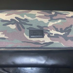 Trendy fold over clutch will pair amazing with pretty much anything.